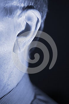 Deaf man hearing aid ear