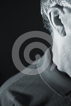 Deaf man hearing aid ear