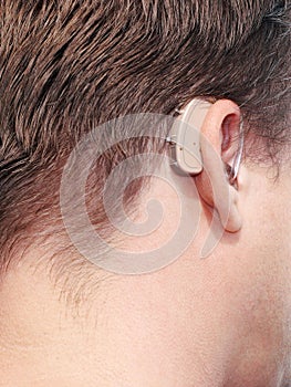 Deaf man's hearing aid.