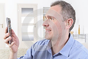 Deaf man using sign language on the smart phone