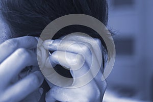 Deaf woman hearing aid ear