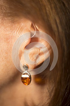 Deaf woman hearing aid ear