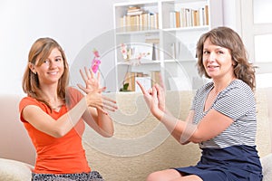 Deaf woman learning sign language