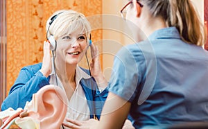 Deaf woman takes a hearing test