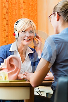 Deaf woman takes a hearing test