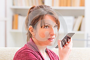 Deaf woman using sign language on the smartphone