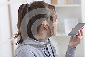 Deaf woman using smartphone