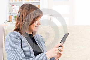 Deaf woman using smartphone