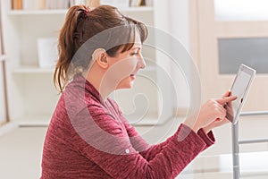 Deaf woman using tablet