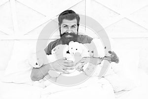 Deal with loneliness on holidays. Happy birthday. Man with beard happy face hold gift toy. Toys shop. present to