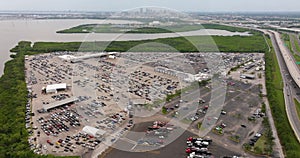 Dealer parking lot with parked used cars ready for sale. Auction reseller company selling secondhand vehicles