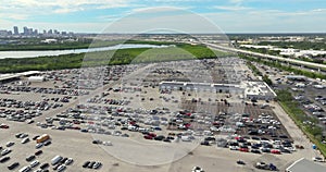 Dealer parking lot with parked used cars ready for sale. Auction reseller company selling secondhand vehicles