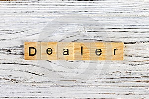 DEALER word made with building blocks concept