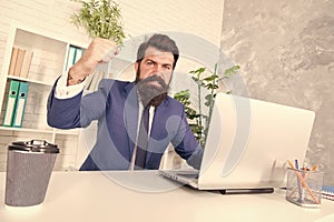 Dealing with anger at work. Bearded man feel anger at work. Businessman show fist in anger. Anger managements. Managing