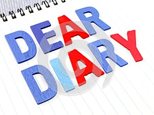 Dear diary word on white paper notebook