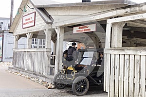 Dearborn, MI / USA - 04.21.2018 : Ford t model in the greenfield village coming out from the model t loading dock