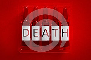 Death of narcotics or drugs addiction concept image. Five ampules with overlay letters of inscription D E A T H. Legal or illegal