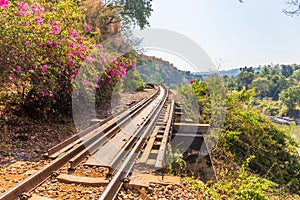 The Death Railway crossing kwai river with Krasae Cave in Kanchanaburi Thailand. Important landmark and destination