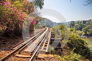 The Death Railway crossing kwai river with Krasae Cave in Kanchanaburi Thailand. Important landmark and destination to visiting