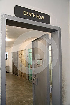 Death row sign over a prison cell block door