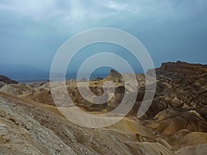 Death Valley - Scenic view of summit peak Manly Beacon seen from Zabriskie Point, Badlands, Furnace creek, Death Valley