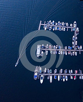 Deatil of pier with boats and yachts in marina