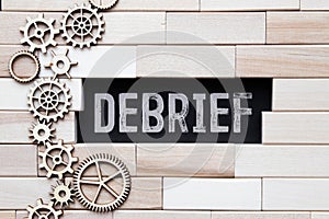 debrief word in a dictionary. debrief concept