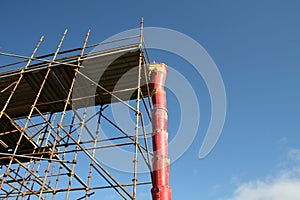 Debris chute and scaffolding