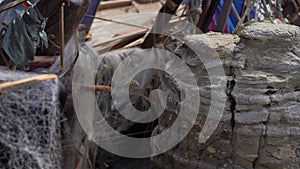 Debris of a fishing ship on a rocky seaside. Shipwreck concept. Storm on a sea. Tsunami concept