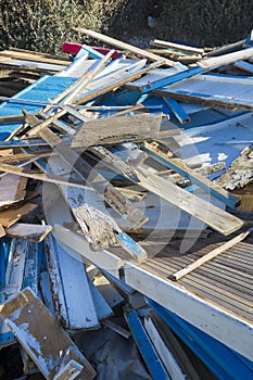 Debris and pieces of timber on the construction site after the demolition of a wooden building