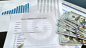 Debt consolidation loan document with graph on table.