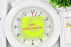 Debt consolidation. This is the process of obtaining a new loan to repay a number of existing debts. The text is written on the