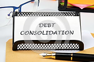 Debt consolidation. This is the process of obtaining a new loan to repay a number photo
