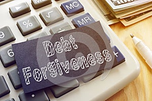 Debt Forgiveness is shown on the conceptual business photo