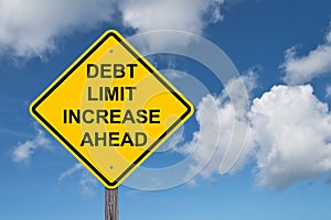 Debt Limit Increase Ahead Caution Sign - Blue Sky Background