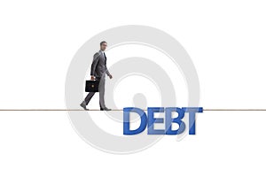 Debt and loan concept with businessman walking on tight rope