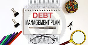 Debt Management Plan on a charts with office tools