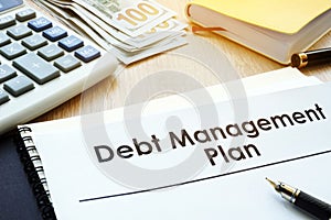 Debt Management Plan on a table.