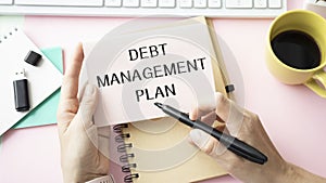 Debt Management Plan on a table. Business