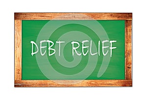 DEBT  RELIEF text written on green school board