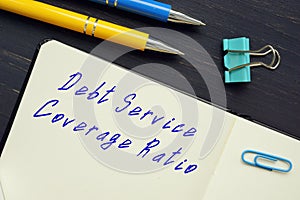 Debt Service Coverage Ratio sign on the sheet