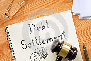 Debt Settlement is shown on the business photo using the text