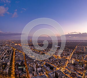 Dec 24, 2019 - Paris, France: Aerial view of Neuilly Levallois Boulogne forest during sunset purple