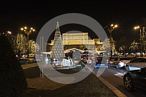 12 DEC 2017 Christmas Market at the Palace of the Parliament Bucharest Romania, Decoration and Christmas tree, many lights and tra