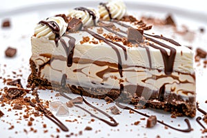Decadent chocolate and vanilla layered cheesecake with drizzled syrup