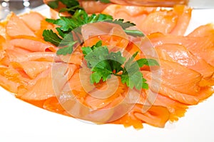 Decadent slices of smoked salmon photo