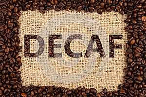 Decaf concept on brown coffee bag background