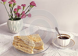 A decaf hot chicory drink and a cake.