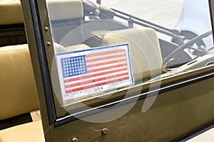 Decal with Americain flag on windshield of military vehicle