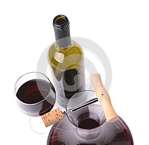 Decanter, bottle and glass with red wine top view